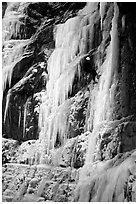 Rappeling from an ice climb in Provo Canyon, Utah. USA (black and white)