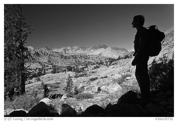 Hiker silhouetted, lower Dusy Basin. Kings Canyon National Park, California