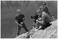 Cameramen filming near lake, lower Dusy Basin. Kings Canyon National Park, California (black and white)