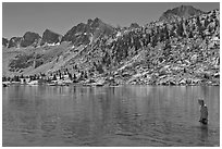 Young man in alpine lake, lower Dusy Basin. Kings Canyon National Park, California (black and white)