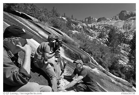 Crew filming a waterfall, lower Dusy Basin. Kings Canyon National Park, California