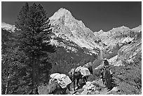 Man riding horse and Langille Peak, Le Conte Canyon. Kings Canyon National Park, California (black and white)