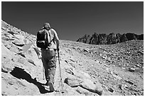 Hiker heading towards Biship Pass, Dusy Basin. Kings Canyon National Park, California (black and white)