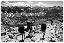 Backpackers below Kearsarge Pass. Kings Canyon National Park, California (black and white)