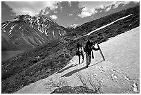 Backpackers crossing a neve. Lake Clark National Park, Alaska (black and white)