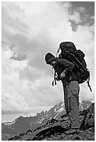 Woman backpacker with a large backpack. Lake Clark National Park, Alaska (black and white)