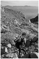 Mountaineers hiking on approach to  East face of Mt Whitney. Sequoia National Park, California (black and white)