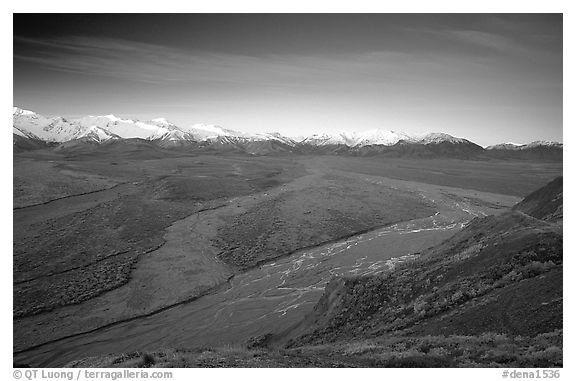 Wide valley with braided rivers and Alaska Range at sunrise from Polychrome Pass. Denali National Park (black and white)
