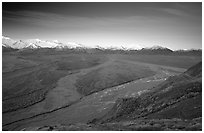 Wide valley with braided rivers and Alaska Range at sunrise from Polychrome Pass. Denali National Park ( black and white)
