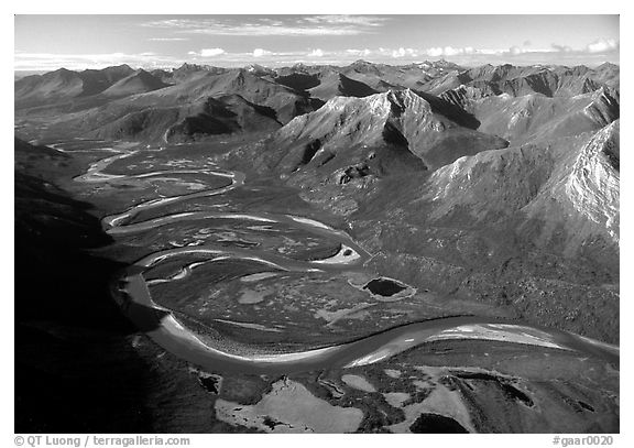Aerial view of meandering Alatna river in mountain valley. Gates of the Arctic National Park (black and white)