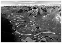 Aerial view of meandering Alatna river in mountain valley. Gates of the Arctic National Park, Alaska, USA. (black and white)