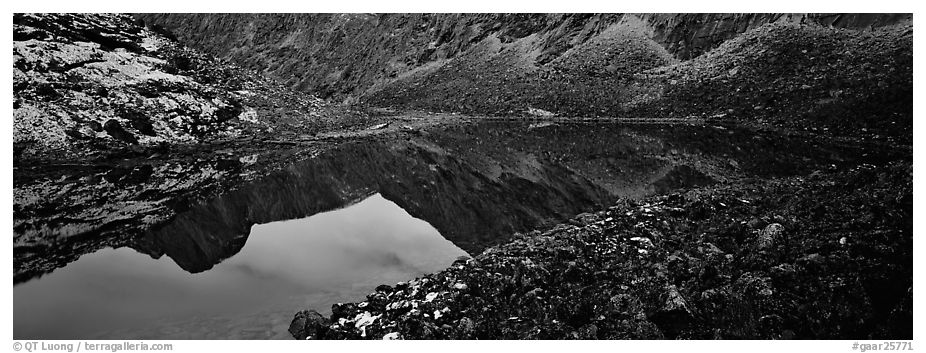 Mountain lake with reflections in rocky environment. Gates of the Arctic National Park (black and white)
