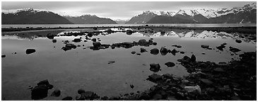 Blue scenery of water and mountains at dusk. Glacier Bay National Park (Panoramic black and white)