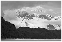 Dark ridge and cloud shrouded peaks, West Arm. Glacier Bay National Park ( black and white)