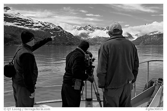 Crew filming from the deck of a boat. Glacier Bay National Park (black and white)