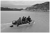 Film crew preparing for landing in a Zodiac. Glacier Bay National Park ( black and white)