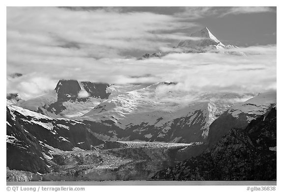 Pointed peaks of Fairweather range emerging from clouds. Glacier Bay National Park (black and white)