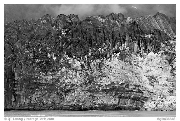 Ice colored by black moraining debris on the front of Margerie Glacier. Glacier Bay National Park (black and white)