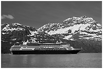 Cruise ship and snowy peaks. Glacier Bay National Park, Alaska, USA. (black and white)