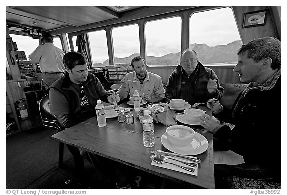 Passengers eating a soup for lunch. Glacier Bay National Park (black and white)