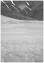 Ash formation on the floor of the Valley of Ten Thousand smokes, below the green hills. Katmai National Park ( black and white)