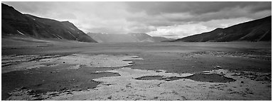 Arid ash plain landscape with colorful deposits. Katmai National Park (Panoramic black and white)