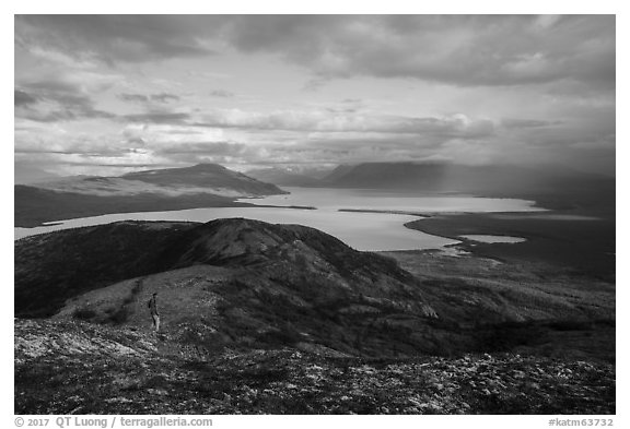 Visitor looking, Naknek Lake from Dumpling Mountain. Katmai National Park (black and white)