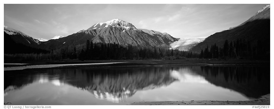Mountains and glacier reflected in Resurrection River. Kenai Fjords National Park (black and white)