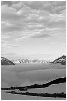 Sea of clouds and craggy peaks. Kenai Fjords National Park ( black and white)