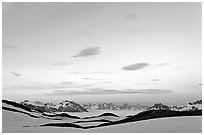 Pastel sky, mountain ranges and sea of clouds at dusk. Kenai Fjords National Park ( black and white)