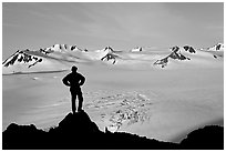 Man standing on overlook above Harding ice field, early morning. Kenai Fjords National Park ( black and white)