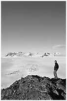 Hiker looking at the Harding icefield. Kenai Fjords National Park, Alaska, USA. (black and white)