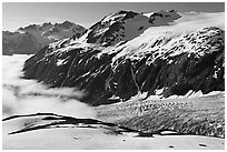 Peaks, glacier, and sea of clouds, morning. Kenai Fjords National Park ( black and white)
