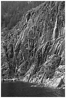 Waterfalls streaming into cove, Northwestern Fjord. Kenai Fjords National Park ( black and white)