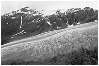 Exit glacier flowing down mountainside. Kenai Fjords National Park, Alaska, USA. (black and white)