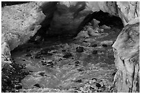 Glacial stream flowing out of ice tunnel, Exit Glacier. Kenai Fjords National Park ( black and white)
