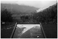 Overflowing Ice interpretive sign. Kenai Fjords National Park ( black and white)