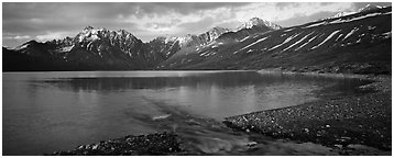 Stream flowing into mountain lake. Lake Clark National Park (Panoramic black and white)