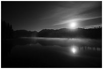 Kontrashibuna Lake and moon at night. Lake Clark National Park ( black and white)