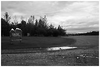 Airport runway and national park sign. Lake Clark National Park ( black and white)