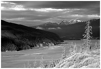 Chitina river valley, snowy peaks, and storm light. Wrangell-St Elias National Park, Alaska, USA. (black and white)
