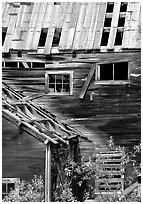 Damaged roof and walls, Kennicott mine. Wrangell-St Elias National Park, Alaska, USA. (black and white)