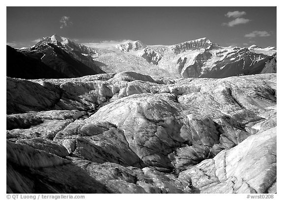 Crevasses on Root glacier, Wrangell mountains in the background. Wrangell-St Elias National Park (black and white)