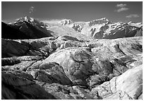 Crevasses on Root glacier, Wrangell mountains in the background. Wrangell-St Elias National Park ( black and white)