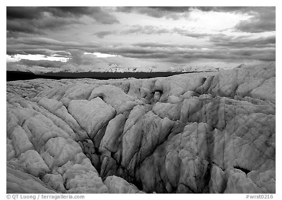 Crevasses on Root glacier at dusk, Chugach mountains in the background. Wrangell-St Elias National Park (black and white)