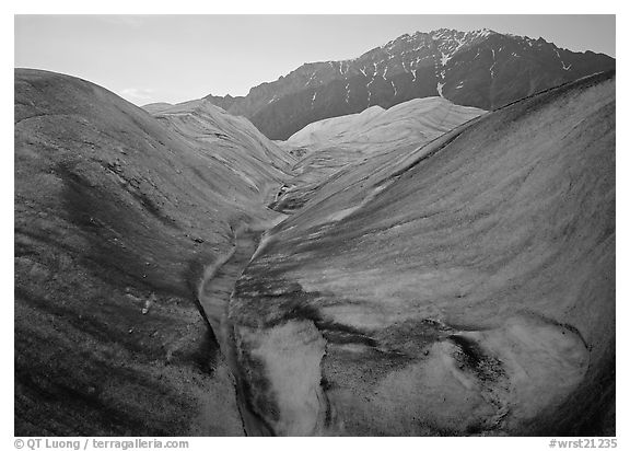 Root Glacier, glacial stream, and mountains at dusk. Wrangell-St Elias National Park (black and white)