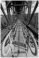 Foot catwalk below the Kuskulana river bridge. Wrangell-St Elias National Park, Alaska, USA. (black and white)