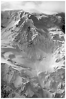 Aerial view of icy face with hanging glaciers and seracs. Wrangell-St Elias National Park, Alaska, USA. (black and white)
