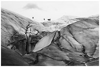 Distant hikers on Root Glacier from below. Wrangell-St Elias National Park ( black and white)