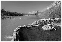 Tourist sitting in hot springs next to river. Big Bend National Park ( black and white)